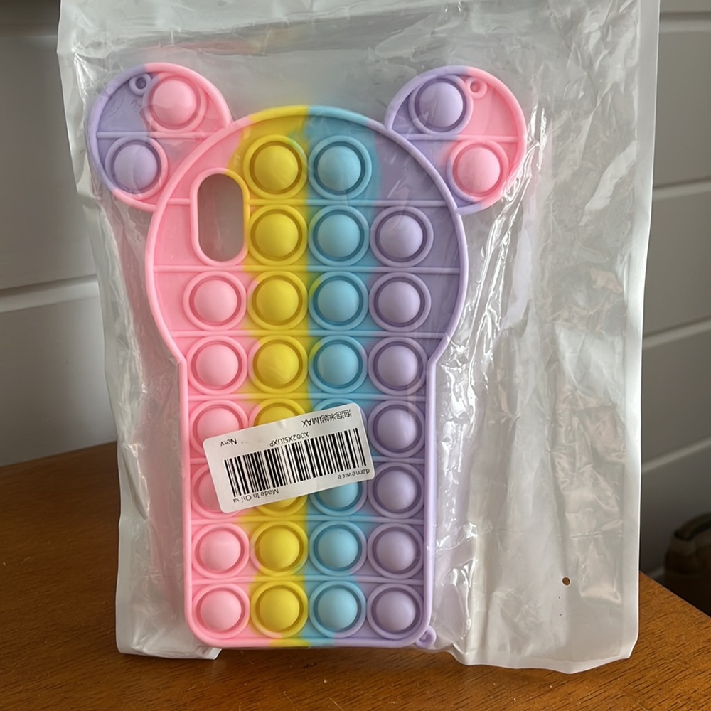 NEW in package fidget phone case - can be just used as a fidget toy *see note *